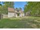 Spacious backyard with a well-maintained lawn and a charming patio area for outdoor enjoyment at 141 Bridgecreek Dr, Goose Creek, SC 29445