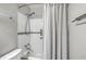 Bathroom featuring shower with decorative tile, and tiled backsplash at 141 Bridgecreek Dr, Goose Creek, SC 29445