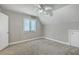 Neutral bedroom with gray walls, a ceiling fan, and a window at 141 Bridgecreek Dr, Goose Creek, SC 29445