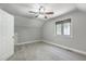 Neutral bedroom with gray walls, a ceiling fan, and a window at 141 Bridgecreek Dr, Goose Creek, SC 29445