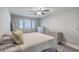 This cozy bedroom features wood-look floors, a ceiling fan, and three dressers for ample storage at 141 Bridgecreek Dr, Goose Creek, SC 29445