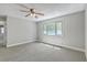 Bright bedroom featuring neutral carpet and a window providing ample natural light at 141 Bridgecreek Dr, Goose Creek, SC 29445
