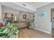 Comfortable living room showcasing an open layout with a stone fireplace, plush seating, and ample natural light at 141 Bridgecreek Dr, Goose Creek, SC 29445