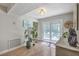 Bright sunroom with sliding doors leading to an outdoor patio, enhanced by natural light and a serene atmosphere at 141 Bridgecreek Dr, Goose Creek, SC 29445