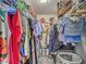Walk-in closet providing ample storage and featuring a carpeted floor at 141 Bridgecreek Dr, Goose Creek, SC 29445