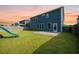 A nice backyard with green grass and a concrete patio at 145 Basket Grass Ln, Summerville, SC 29486