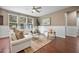 Cozy living room with neutral décor, ample natural light, and comfortable seating arrangements for relaxation and socializing at 145 Basket Grass Ln, Summerville, SC 29486