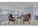 Seating area featuring leather chairs, a table and wood railings at 1531 Capel St, Mount Pleasant, SC 29466