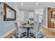 Dining area features a table with seating for four, a patterned rug, and light blue walls at 1531 Capel St, Mount Pleasant, SC 29466
