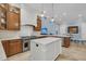 Spacious kitchen features an island, stainless steel appliances, and wood and white cabinets at 1531 Capel St, Mount Pleasant, SC 29466