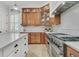 Gourmet kitchen with stainless steel appliances, granite countertops, and custom cabinets and tiled backsplash at 1531 Capel St, Mount Pleasant, SC 29466
