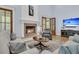 Comfortable living room features a fireplace, seating, and a television, perfect for relaxing at 1531 Capel St, Mount Pleasant, SC 29466