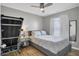 Comfortable bedroom features neutral walls, ceiling fan and window with lots of natural light at 157 Tyger St, Summerville, SC 29485