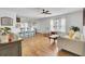 Bright living area featuring hardwood floors, comfortable seating, and an open layout design at 157 Tyger St, Summerville, SC 29485