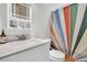 Neat bathroom with bright shower curtain and modern vanity at 1595 Teal Marsh Rd, Charleston, SC 29412