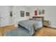 Cozy bedroom with neutral tones, hardwood floors, and a serene vibe at 1595 Teal Marsh Rd, Charleston, SC 29412