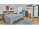 Cozy bedroom with neutral tones, hardwood floors, and a serene vibe at 1595 Teal Marsh Rd, Charleston, SC 29412