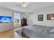 Relaxing bedroom with large dresser, TV, natural light, and a calm vibe at 1595 Teal Marsh Rd, Charleston, SC 29412