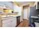Modern kitchen with white cabinets, stainless steel appliances, and stylish countertops at 1615 Chatelain Way, Mount Pleasant, SC 29464