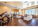 Spacious living room area features a grand piano, bar seating, and plenty of room for entertaining at 1615 Chatelain Way, Mount Pleasant, SC 29464