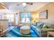 Comfortable living room with stylish furniture, a bright rug, and a view into the dining area at 1615 Chatelain Way, Mount Pleasant, SC 29464