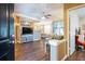 Inviting living room featuring hardwood floors, a ceiling fan, and comfortable seating near large windows at 1615 Chatelain Way, Mount Pleasant, SC 29464
