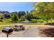 Picturesque pond with a fountain, picnic table, grill and lush landscaping at 1615 Chatelain Way, Mount Pleasant, SC 29464