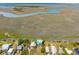 Wide aerial view of beautiful waterfront property and serene marsh waterways at 1676 E Ashley Ave, Folly Beach, SC 29439