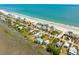 Scenic aerial view of a beach community with colorful homes near the ocean at 1676 E Ashley Ave, Folly Beach, SC 29439