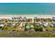 Beautiful view of multiple beach homes from above with stunning sandy beach and ocean views at 1676 E Ashley Ave, Folly Beach, SC 29439