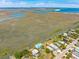 Expansive aerial shot showcasing waterfront homes along the tranquil, winding waterways at 1676 E Ashley Ave, Folly Beach, SC 29439