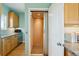Modern kitchen with stainless steel appliances, elevator access, and well-organized storage spaces at 1676 E Ashley Ave, Folly Beach, SC 29439