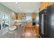 Modern kitchen features granite countertops, custom wood cabinets, stainless steel appliances, and natural light at 1676 E Ashley Ave, Folly Beach, SC 29439