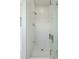 All tile walk-in shower with glass enclosure and modern fixtures at 1676 E Ashley Ave, Folly Beach, SC 29439