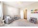 Cozy Bedroom with crib, comfy chair, bookshelf, and a colorful accent chair at 1755 Bolden Dr, Mount Pleasant, SC 29466