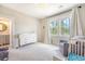 Bright Bedroom with modern furniture, natural light from two large windows, and neutral paint at 1755 Bolden Dr, Mount Pleasant, SC 29466