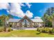 Community pavilion featuring brick columns, a metal roof, and fireplace at 1755 Bolden Dr, Mount Pleasant, SC 29466