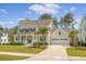 Beautiful two-story home with a two-car garage and a well-maintained front yard at 1755 Bolden Dr, Mount Pleasant, SC 29466
