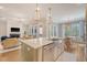 Open-concept kitchen with a large island, stainless steel appliances, and hardwood floors at 1755 Bolden Dr, Mount Pleasant, SC 29466