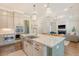 Well-appointed kitchen showcasing a large island with stainless appliances and open to the living room at 1755 Bolden Dr, Mount Pleasant, SC 29466