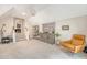 Cozy bonus room area featuring a comfortable leather chair and staircase to the second floor at 1755 Bolden Dr, Mount Pleasant, SC 29466