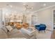 Open living room showcasing a seamless transition to the gourmet kitchen with stainless steel appliances at 1755 Bolden Dr, Mount Pleasant, SC 29466