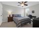 Bedroom features a window-side desk setup and a ceiling fan for added comfort at 1907 Mossdale Dr, Johns Island, SC 29455
