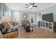 Inviting living room with hardwood floors, a ceiling fan, and comfortable seating at 1907 Mossdale Dr, Johns Island, SC 29455