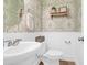 Chic powder room with decorative wallpaper, modern fixtures, and a clean, fresh feel at 1907 Mossdale Dr, Johns Island, SC 29455