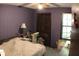 The cozy bedroom features wood-look closet doors, carpeted floors, and a bright window for natural light at 20 Anderson Ave, Charleston, SC 29412