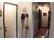 Welcoming hallway with light walls and wood-look floors featuring decor and an open floor plan at 20 Anderson Ave, Charleston, SC 29412