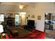 Bright living room featuring a brick fireplace, ceiling fan, and comfortable seating at 20 Anderson Ave, Charleston, SC 29412