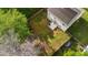 Aerial view of the home's fenced backyard, lawn, trees and patio area at 2007 Robin Wood Blvd, Moncks Corner, SC 29461