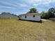Spacious backyard featuring a well-maintained lawn and serene setting at 202 Resinwood Rd, Moncks Corner, SC 29461
